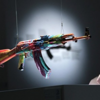 Damien Hirst’s “Spin AK47 for Peace Day”